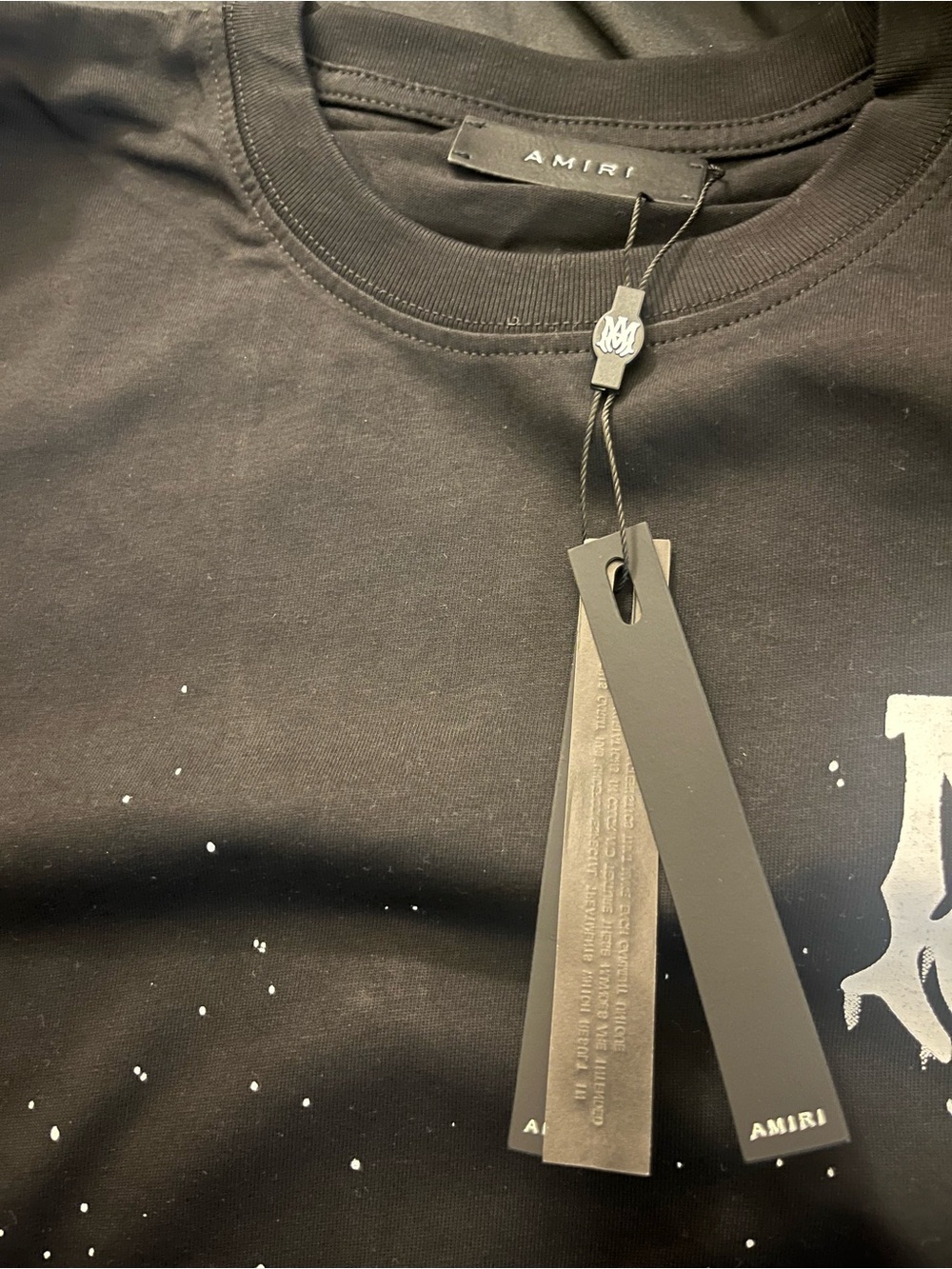 AMIRI Black Tee with White Paint-Speck Detail